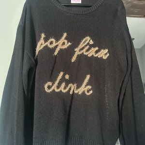 Pink Lily Black Sweater with Gold Text